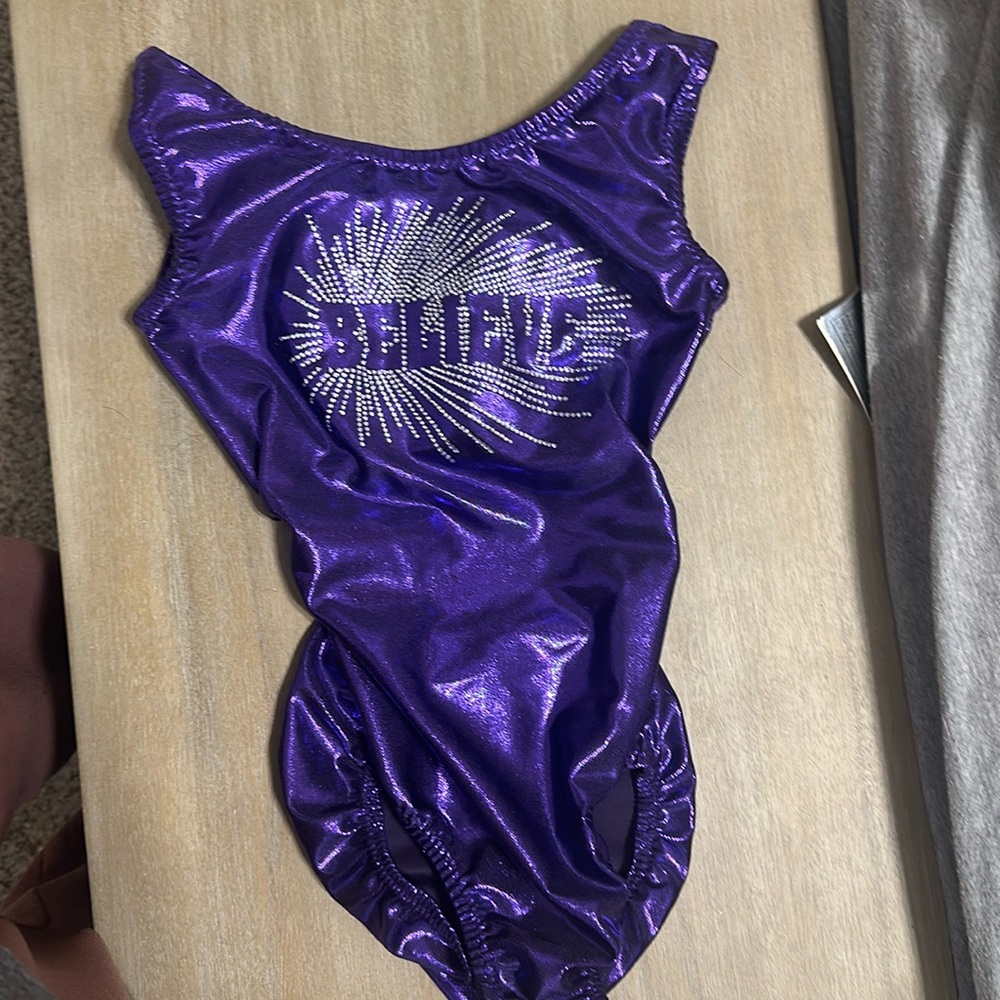 Vibrant purple foxy Leo. Worn once